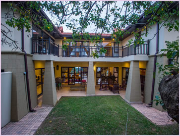 The Zimbali Holiday Home's Acaciawood unit has a patio in the backyard, which is perfect for a braai/barbeque